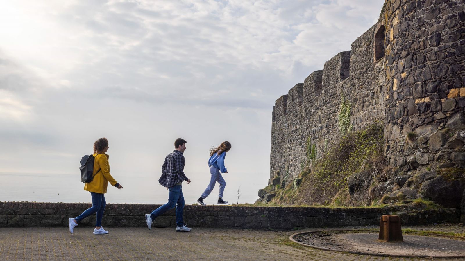 Family walking towards the Castle gates